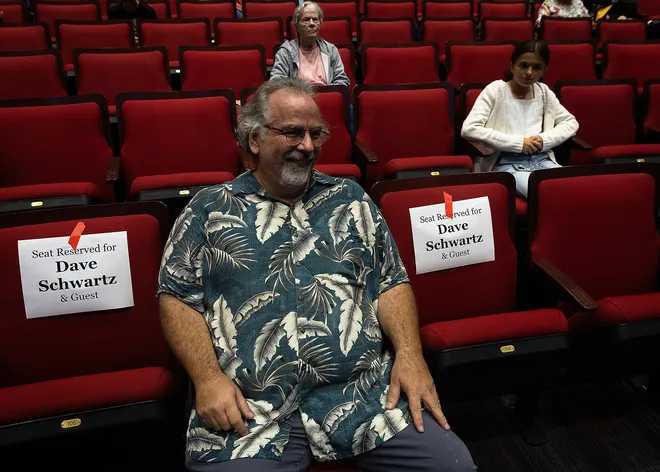 Dave Schwartz, a composer from Panama City Beach, Fla., arrives for the world premiere of his marimba song May 12, 2025, during Bay High School’s Spring concert. Schwartz said he wrote "Somewhat Disoriented" for Silas Dyer, a junior at the school, after seeing Kelly Dyer's social media posts about her son playing the marimba. (Tyler Orsburn/News Herald)